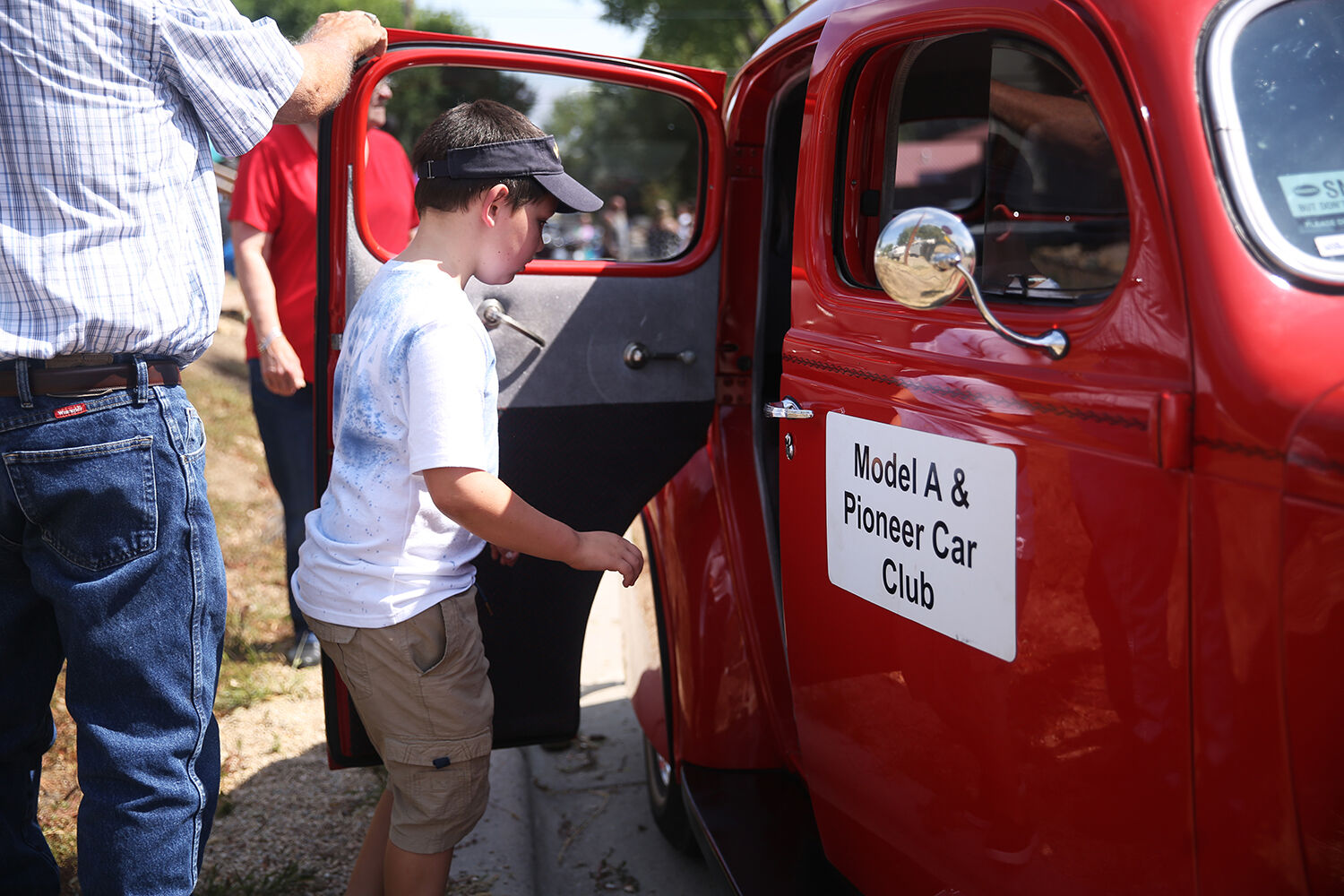 Lane hops into Dan Wasserburger’s car for a drive around town